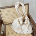 Borsa a spalla in tela crema con ricami a farfalla colorati e trama a quadretti - Beige