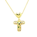 Detail of gold letter T balloon pendant with colorful zircon stones on white background - Letter-T