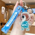 Portachiavi astronauta con sabbie mobili blu, paillettes e cinturino in silicone - Astronauta dell'Oceano-Faccia nera in piedi