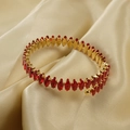18K gold plated open bangle featuring marquise-cut red zircon stones on satin base - Red