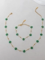 Bohemian gold stainless steel jewelry set featuring green crystal flower beads - Green Necklace And Bracelet