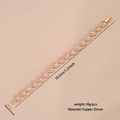 Goldenes Armband mit rosa herzförmigen Zirkonsteinen und funkelnden Diamantakzenten - Herzform