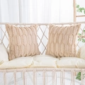 Pair of cream plush pillow covers with geometric woven texture on a white hanging chair - 18x18 Inch / Cream Hexagon