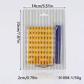 Vista dettagliata di stampi per biscotti fai-da-te con lettere e numeri in plastica - 01098-1 Confezione in Cartoncino (Piastra Gialla + Barra Blu)