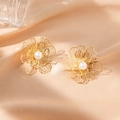 Elegant gold hollow flower earrings with white pearls on champagne silk fabric - Flower 1-2