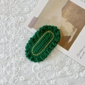 Handmade crochet green oval hair clip with gold thread details on lace background - Pure Green Oval Woven Hair Clip