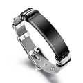 Detailed macro view of adjustable silver mesh steel bracelet with black engravable plaque - Silver Mesh Band Black Case