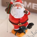 Miniature resin Santa Claus figurine with gift box, 8cm tall Christmas ornament - Santa with Gift Box