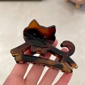 Matte amber cat-shaped hair claw clip with tortoise shell pattern and bow detail - Leopard Cat Shaped Claw Clip
