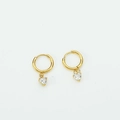 Golden heart-shaped hoop earrings with transparent cubic zirconia stones for women - White