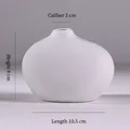 Modern matte white ceramic bud vase with flat round shape and narrow neck 2x8x10.5cm - Small Oval - White