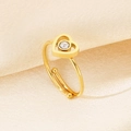 Macro shot of gold heart ring with round white zircon inlay on silk background - One Size(Adjustable) / Gold Heart with Zirconia
