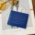 Slim navy blue woven sheepskin card holder with multiple slots in a lifestyle setting - Sapphire Blue