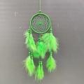 Handmade woven dreamcatcher with vibrant green feathers and wooden beads decoration - Forest Style / Green