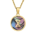 Detailed macro view of 18K gold plated necklace pendant with letter X and colorful shell inlay - Gold X