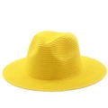 Detail view of tight weave texture and crown shape on a bright yellow straw Panama hat - Yellow