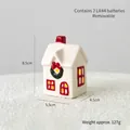 White ceramic Christmas house with red chimney and LED glow for festive tabletop decor - Red Fairytale House E