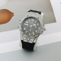 Detail view of octagon quartz watch with grey textured case and black silicone strap - Silver Case Black Dial Black Strap