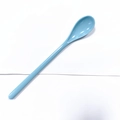 Single long handle light blue melamine dessert spoon shown on a clean white background - Sky Blue