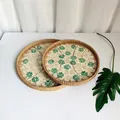 Detailed view of two handmade rattan trays with inlaid green four-leaf clover shell designs - Four-Leaf Clover / 2-Piece Set
