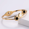 Brazalete de acero dorado con números romanos, incrustaciones de nácar y cristales - Estilo Concha / Dorado