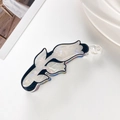 Detailed view of white tulip hair clip with shell luster finish and black outlines - Black