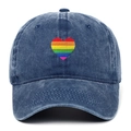 Detail shot of rainbow heart embroidery on vintage blue washed denim baseball cap - One Size / Navy Blue