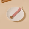 Close-up of pink cotton muslin pacifier clip with a natural beech wood round buckle - Pink Style (6)