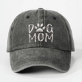Detailed view of white DOG MOM embroidery and paw print on washed charcoal baseball cap - One Size / Black