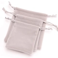 Three sizes of grey velvet drawstring jewelry pouches for storage and gift packaging - Light Gray