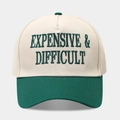 Detailopname van vintage baseballpet met Expensive & Difficult borduursel in groen - Verstelbaar / Off-white/Groen