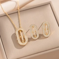 Elegant gold-tone oval necklace and earring set with cross pattern and clear zircon stones - Gold Jewelry Set (303)