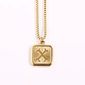 Golden box chain necklace featuring a square pendant with embossed letter X and sunburst rays - Letter X