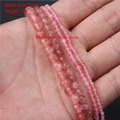 Macro detail of natural pink strawberry quartz beads in 2mm to 6mm sizes for jewelry making - 2mm Faceted Round Beads