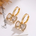 Elegante goldene Schleifenohrringe mit Zirkonia-Steinen im minimalistischen Design - Goldene Schleife (43883)