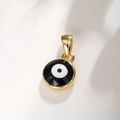 Macro view of gold-plated round evil eye pendant with black and white enamel detail - A024 Gold Black Eye 8mm