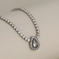 Luxe silver stainless steel tennis chain necklace with a pear-cut waterdrop diamond pendant - Pear Shape Pendant / Silver