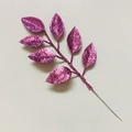 Macro shot of artificial purple glitter leaves for Christmas tree decoration and DIY crafts - Purple