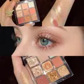 Detailed swatches and eye makeup look of a 9-color matte and glitter warm eyeshadow palette - No. 10 Warm Orange Tones