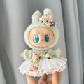 Green plush hooded jacket with white lace skirt for collectible plush doll figures - White Headpiece Wedding Dress / First And Second Generation Keychains Are Compatible With La Cloth Dolls. Dolls Not Included.