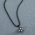 Detailed macro view of black box chain necklace with black and white enamel soccer ball pendant - Box Chain Soccer / Black and White