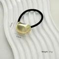 Minimalist gold pebble charm hair tie with elastic black band, size 2.5cm x 3.5cm - Gold Small Bean Ingot