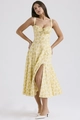 Detail shot of a yellow floral midi dress featuring a slim waist and side slit design - S / Top And Bottom / Yellow with Yellow Floral