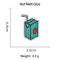Embroidered cartoon juice box patch with hot melt adhesive backing and apple detail - Apple Juice Box