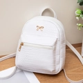 White faux crocodile skin mini backpack with golden bow detail and metal zippers - White