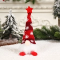 Close-up of a glowing Christmas gnome with red snowflake hat and plush white beard - Short Legs Red With Light