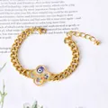 Gold chunky chain bracelet with clear clover charm and blue evil eye bead detail - Clover & Infinity