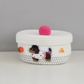White handwoven cotton rope storage basket featuring red pom-pom lid and dog patch - Oval Lid Black Line - Spotted Dog (22*15*10)
