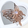Detail of gradient brown butterfly hair claw clip with iridescent jewel on heart mirror - Coffee Rhinestone Butterfly