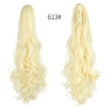 Long wavy ponytail hair extension with claw clip in light blonde shade 613 - Bleach Blonde